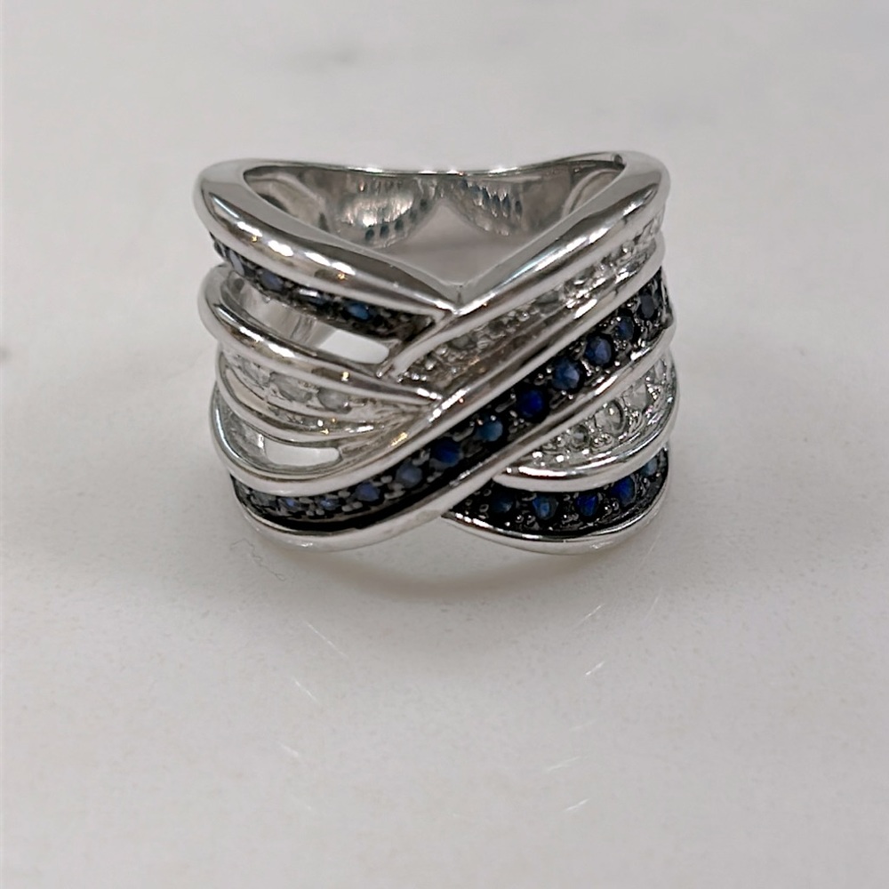 Sterling silver blue and white stone wrap ring